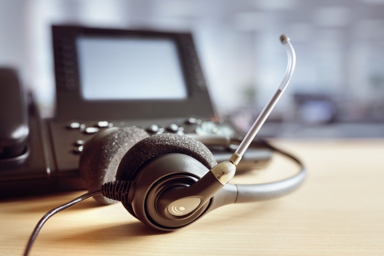 VOIP Headset and Phone on Desk