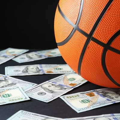 Basketball with 100 Dollar Bills